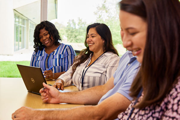 employees at a conference room table